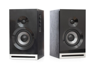 Obraz premium Pair of modern black wooden sound speakers, acoustic system isolated on a white background.