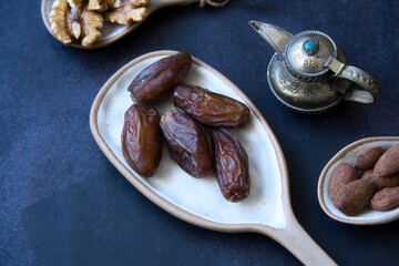 Ramadan Kareem. Dates, walnuts, and almonds.