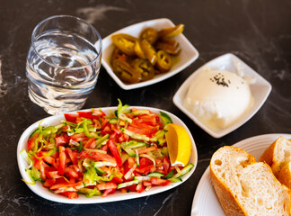 Fresh vegetable salad and cheese. Traditional Turkish vegetable dish. Served before main courses