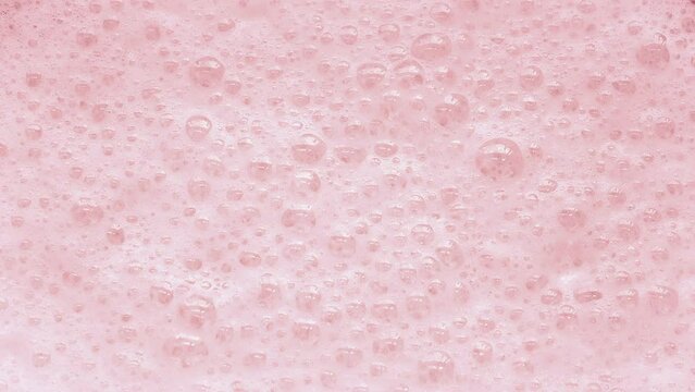 Strawberry Milkshake Bubbles Popping Closeup