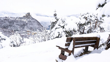 Image of the Ancient/ Abbey of San Michele built on Mount Pirchiriano located at the entrance of the Susa Valley, around the years between 983 and 987 A.D. with an abundant snowfall