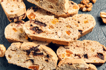 Delicious biscotti cookies on grunge background