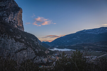 Top morning view on Toblino lake in Trentino from Sarche. January 2023