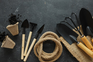 Set of gardening tools on a black background