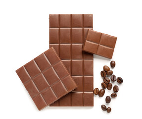 Tasty chocolate and coffee beans on white background