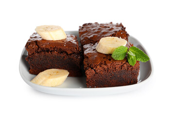 Plate with pieces of tasty chocolate brownie isolated on white background