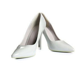 Pair of stylish high heeled shoes on white background