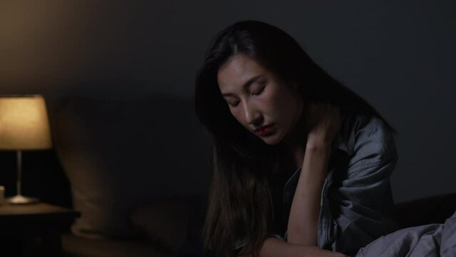 Depressed young Asian woman can not sleep from insomnia