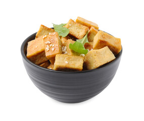 Delicious fried tofu, basil and sesame seeds in bowl isolated on white