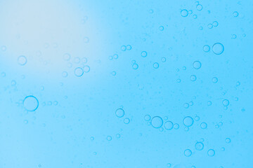 Air bubbles in the water background.Abstract oxygen bubbles in the sea.Water bubbles isolate on blue background.Air bubble floating up to top of water surface which little and big circle shape.