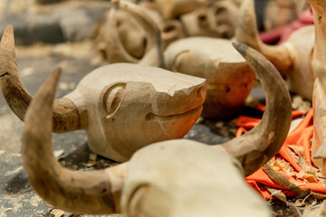 several bull carved in wood in the cultural floor of carnival barranquilla
