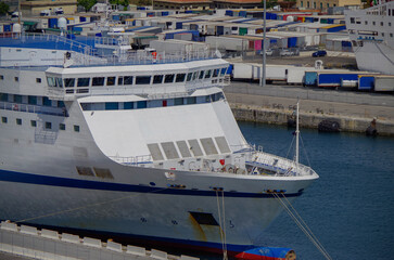 Fototapeta premium Large modern Passenger pax cargo roro ro-ro ferry cruiseship cruise ship liner with port