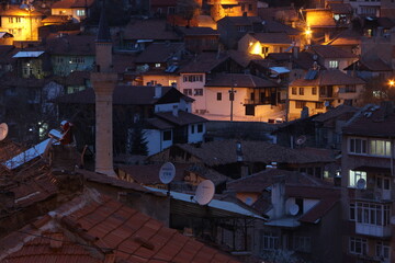 houses with a light on in the middle of the night