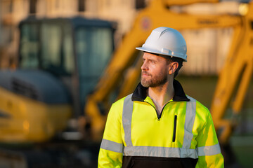 Worker in helmet on site construction. Man excavator bulldozer worker. Construction driver worker...