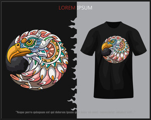 Colorful eagle head mandala arts isolated on black t-shirt.