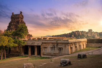 Ancient medieval architecture of Raghunatha Temple at sunset built in the 16th century CE at Hampi Karnataka, India