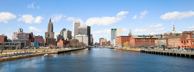 A view of Providence, Rhode Island showcasing a modern cityscape with towering skyscrapers, bustling streets and a thriving urban environment. A perfect representation of the modern metropolis.
