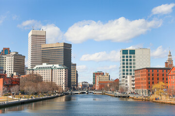 A view of Providence, Rhode Island showcasing a modern cityscape with towering skyscrapers, bustling streets and a thriving urban environment. A perfect representation of the modern metropolis.
