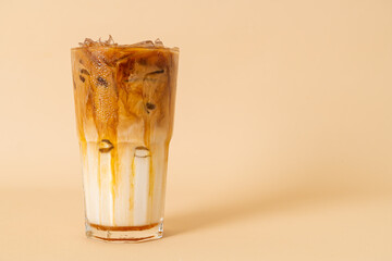 caramel macchiato coffee in glass - obrazy, fototapety, plakaty