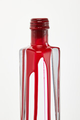 bottle with red liquid