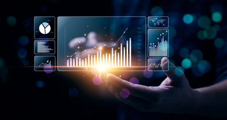 Businessman analyzing business enterprise data management, Business analytics with charts, metrics and KPIs to performance organization. Corporate strategy for finance, operations, sales, marketing