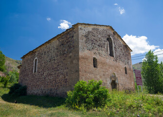 Fototapeta na wymiar The ancient city of Krom valley. Alikinos Church. Historical old churches of Turkey. Torul, Gumushane, Turkey