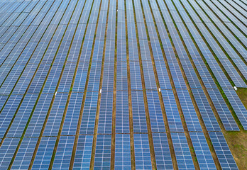 Solar cell panels at solar farm, drone view. Green energy concept.