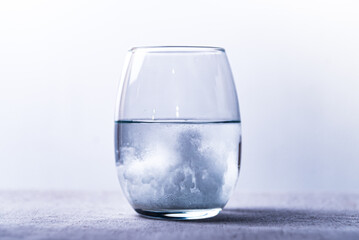 effervescent, A glass of water with a cloud of water in it
