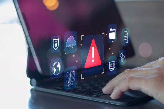 Developer programmer using laptop with warning triangle sign for alert found error and maintenance concept