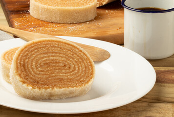 Focus on delicious typical Brazilian dessert roll cake.