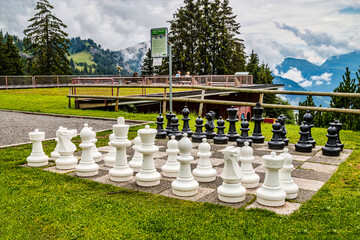 Giant chess board at Mount Rigi, with scenic view of cloud covered Swiss Alps, Mount Rigi,...