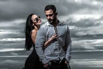 Sexy couple in tender passion. Beautiful sensual woman and sexy man. Sensual couple passionately embracing. Sexy couple lifestyle moment. Lovely man and woman. Young couple in love.