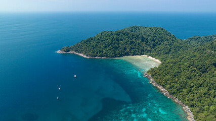 Fototapeta na wymiar Aerial view with The tropical seashore island in a coral reef ,blue and turquoise sea Amazing nature landscape
