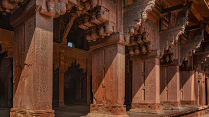 Details of the architecture of the Jahangiri Mahal Palace in the Red Fort. Colonnade with elegant...