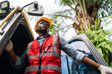 Construction worker person with backhoe loader or industry tractor, professional technician working...