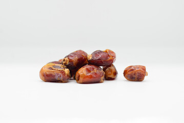bunch of tasty dry dates isolated on white background
