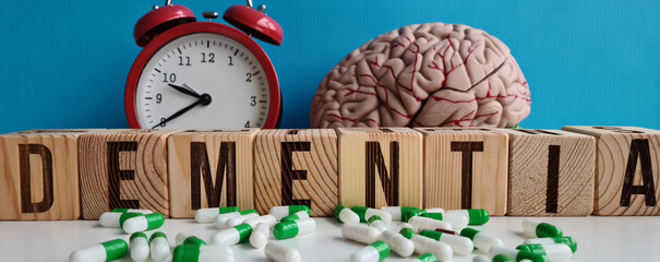 Brain anatomy and capsules with pills and an alarm clock