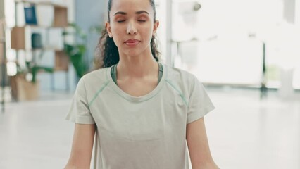 Mudra meditation, woman and home workout in lotus for mental health, yoga training and chakra energy. Focused female meditate in living room, exercise and praying for wellness, peace and calm mindset