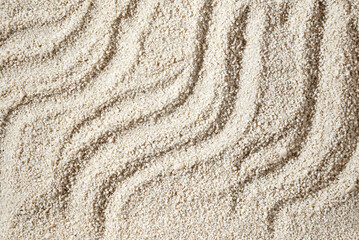 Aesthetic minimalist summer vacation background, waves ornament on neutral beige beach sand texture, copy space