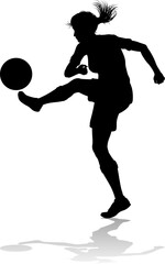 A female soccer football player woman in silhouettes