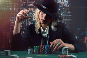 Woman dealer or croupier shuffling poker cards in casino holding two playing cards. Casino. poker