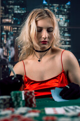 rich woman wear evening red dress playing poker, holding cigar