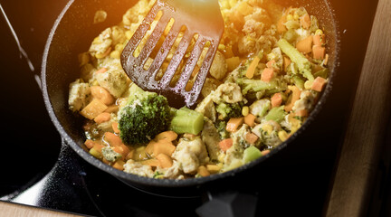 Roasted vegetables in a frying pan.