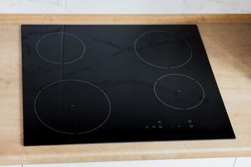 Modern kitchen interior with black induction