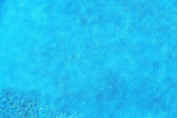 Fototapeta na wymiar Transparent and bubbly water in a swimming pool. Vacation and freshness concept. Abstract water and bubbles background