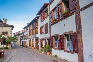 Fototapeta na wymiar Old houses with shutters in the historic central street of Saint-Jean-Pied-de-Port, France