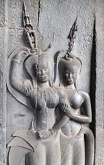 Wall carving -  apsara dancers, famous Angkor Wat complex, Siem Reap, Cambodia. UNESCO world heritage site