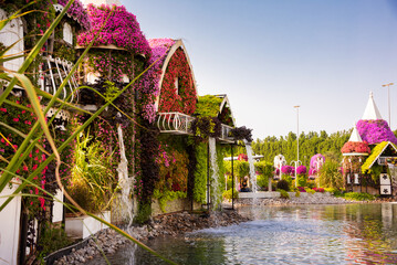 Flower houses at Miracle garden in Dubai, beautiful park with many flowers and decoration