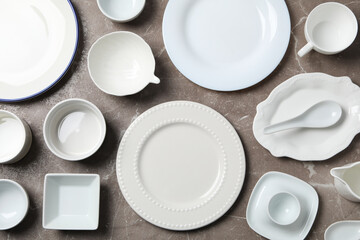 Minimal table setting with blank dish, top view