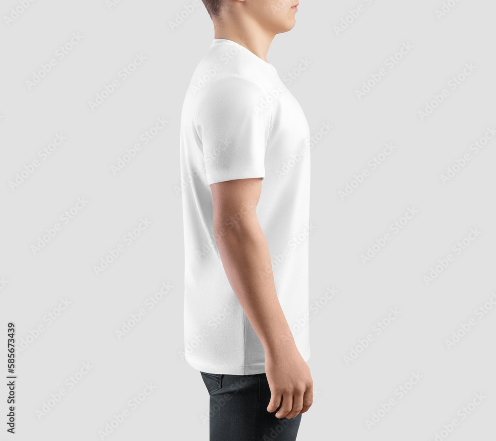 Wall mural Mockup of white crew-neck t-shirt for men, side view, streetwear isolated on background in studio.